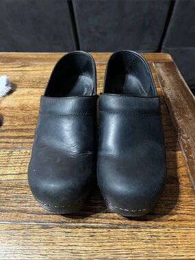 Dansko Black Leather Slip-On Clogs